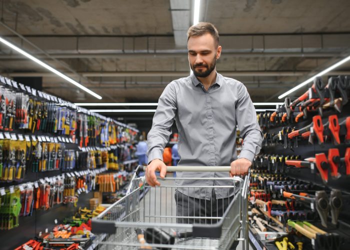 male builder in a hardware store.